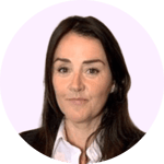 The image shows a headshot of a woman with dark hair and a friendly expression, wearing a white collared shirt against a light pink background.