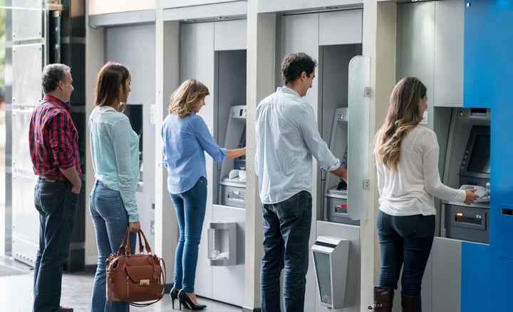 People using ATM's.